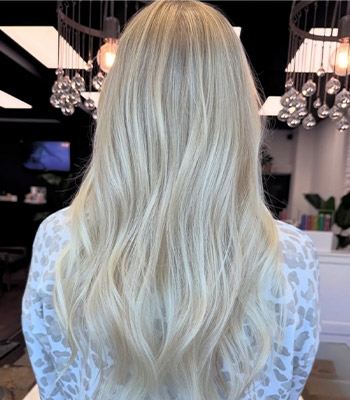 Blonde balayage hair color by expert stylist at Brodava Salon Perrysburg